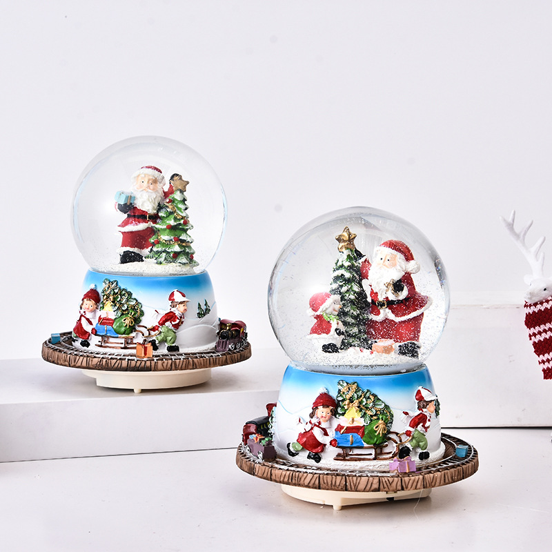 Handgemachte kundenspezifische Polyresin Santa Claus Musikalische Weihnachtsschneekugel mit drehbarer Basis